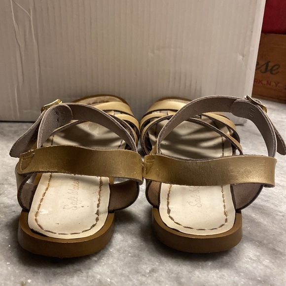 Used gold salt water sandles a little worn out but still cute and colorful. - Picture 6 of 8